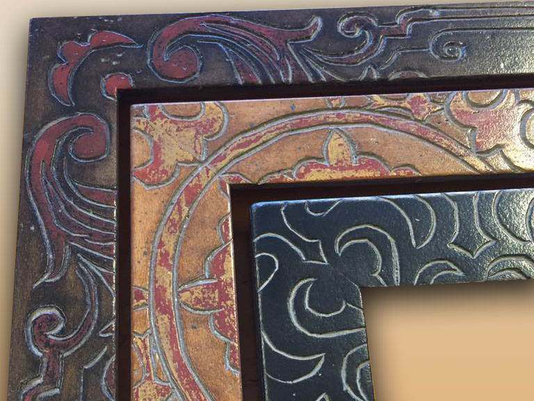 We fabricate our own picture frames in our workshop and then hand paint and carve them in our studio. 